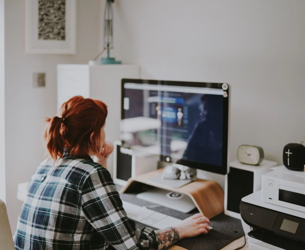 Woman looking at a computer