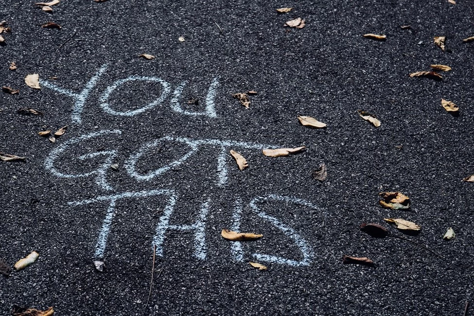 'You Got This' chalk writing on pavement