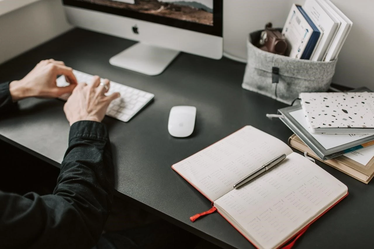 Person working in front of a computer