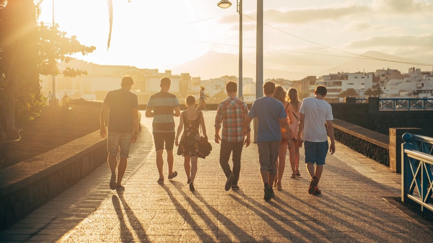 A team of people walking on a street